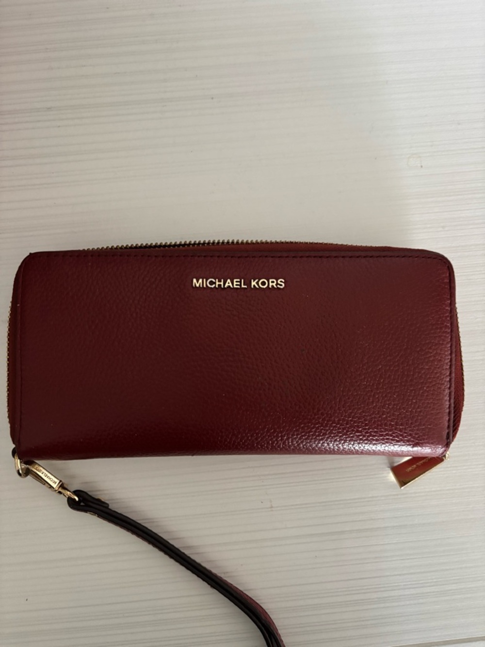 Michael Kors Maroon Leather Wristlet with Gold Logo